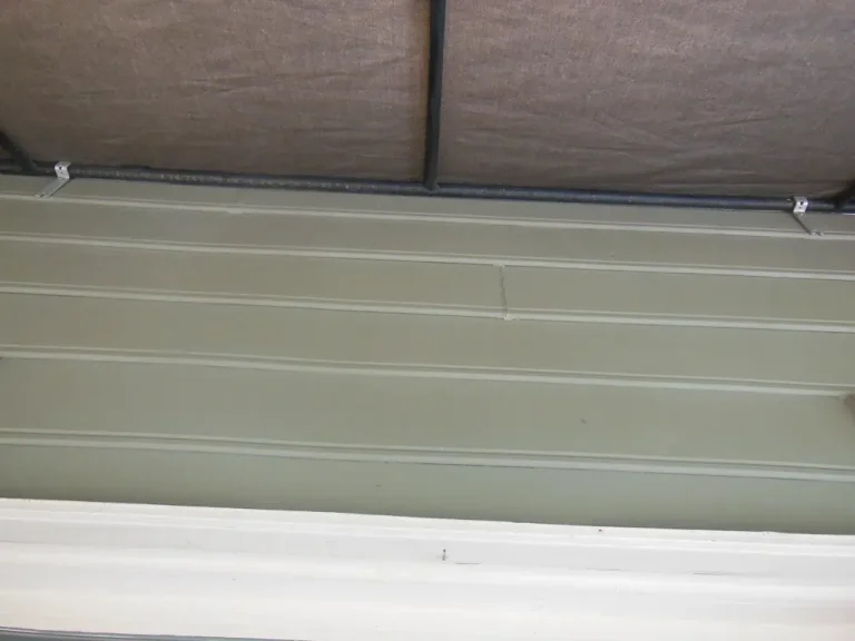 After the repair was completed, we reinstalled the canvas to the frame and replaced it.