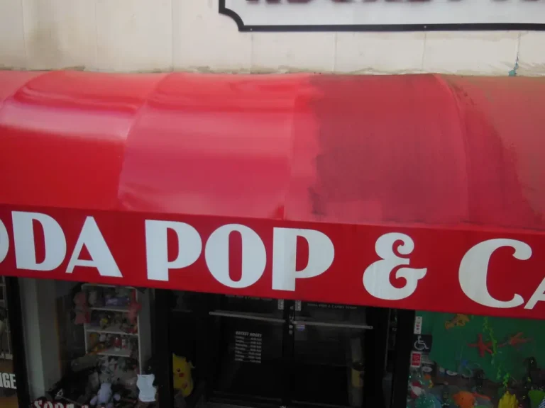 Half cleaned vinyl awing at a business in Marietta at the Marietta Square.